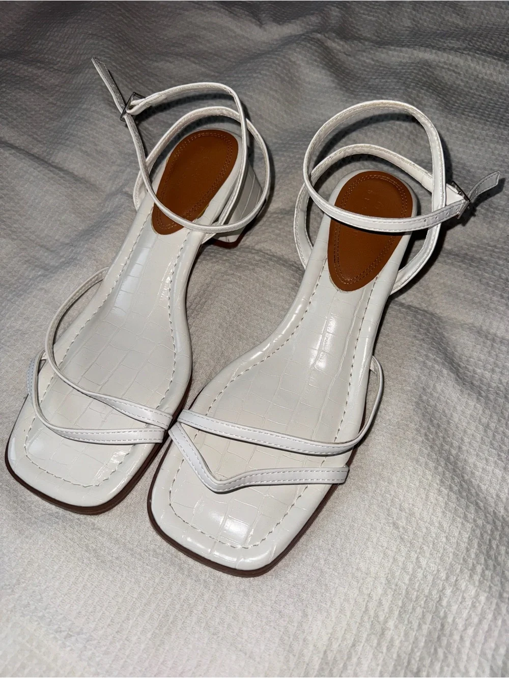 White strappy sandals